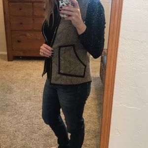 Brown and white chevron with black trim vest